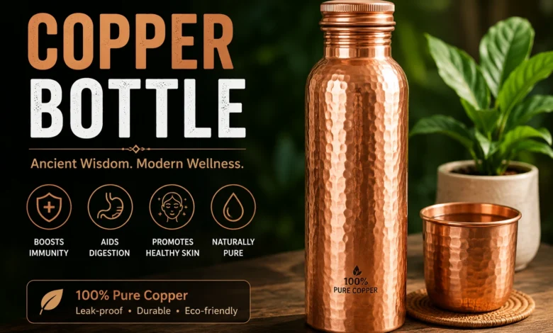 Copper bottle with water, lemon, mint, and natural wellness ingredients