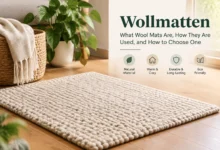 Modern living room with a soft ivory Wollmatten wool mat on wooden flooring, showing a natural, cozy, and eco-friendly home decor style.